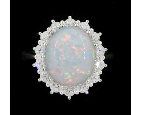 Silver opal and cubic zirconia cluster ring, stamped 925Condition Report:Ring size Q, head diameter = 17mm x 15mm, good condi