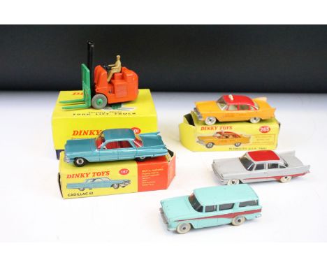 Three boxed Dinky diecast models to include 401 Coventry Climax Fork Lift Truck, 147 Cadillac 62 and 265 Plymouth USA Taxi pl