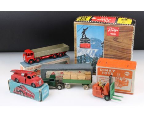 Four boxed mid 20th C play worn diecast &amp; tin plate models to include 2 x Dinky (No 501 Forden Diesel 8 Wheel with red ca