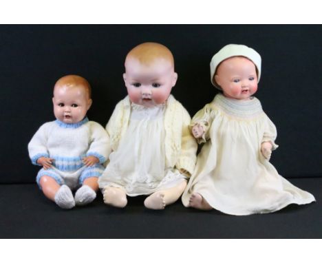 Three German bisque headed dolls to include Armand Marseille 351/10K dream baby, an A. S. 261/8 baby doll and another example