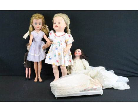 Four mid 20th C dolls to include Camay Hong Kong Sindy clone doll, Chiltern and BND London, along with a Sindy bed 