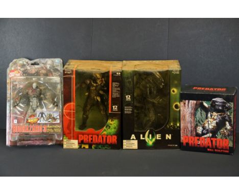 Collection of four boxed and carded figures to include boxed Diamond Selects Predator Wall Sculpture ltd edn 219/2000, carded