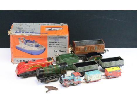 Boxed Marx Battery Operated SRN5 Hovercraft (gd with tatty box) plus a group of tin plate locomotives and rolling stock featu