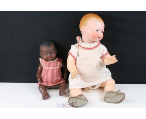Two Armand Marseille bisque headed dolls to include black baby with stiff glass sleeping eyes, teeth, marked 351/4.1k AM Germ