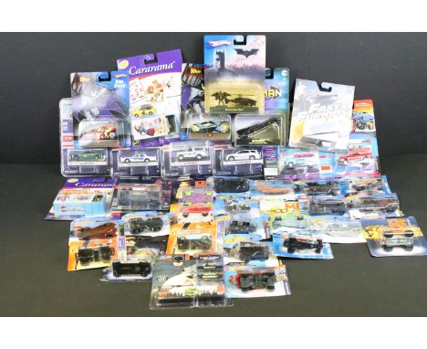 34 carded diecast models to include Mattel Hot Wheels Batman, Greenlight Hollywood Terminator, Greenlight Hot Pursuit, Carara