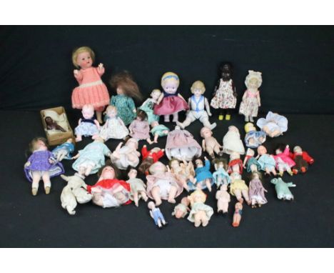 Collection of small / miniature dolls featuring antique, German, bisque and plastic examples, condition varies 