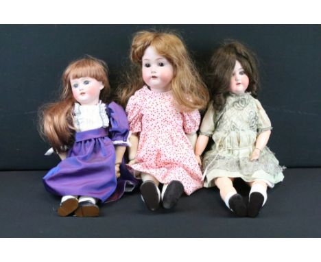 Two German bisque headed dolls to include a Simon &amp; Halbig child doll having sleeping eyes, hand painted details and an o