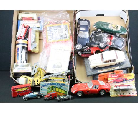 Collection of various boxed and unboxed diecast models to include 7 x unboxed Maisto and Burago diecast models featuring Ford