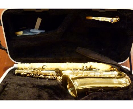 Trevor James Alto saxaphone in hard case, lacking mouthpiece    CONDITION REPORT:  The sax appears to be almost unplayed, Rev