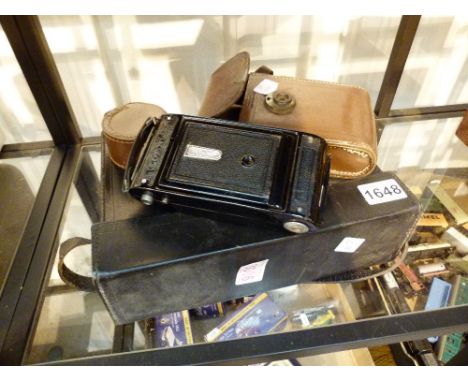 Bell & Howell movie camera and a Coronet folding camera 