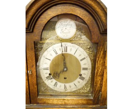 Grandmother clock with brass face silvered chapter ring with Westminster chimes   CONDITION REPORT:  Working at lotting up