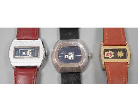 Three assorted steel or gilt steel jump hour digital manual wind wrist watches, including Astral and Lanco.