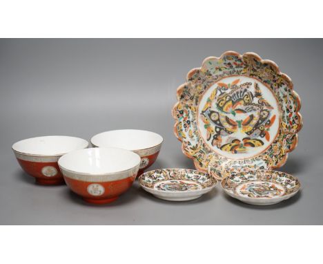 A Chinese 'thousand butterfly' dish and two saucers, early 20th century and three later Chinese coral round bowls, largest 20