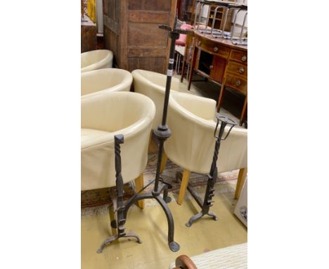A wrought iron tripod pricket candlestick, height 138cm, together with a pair of andirons and a snuffer