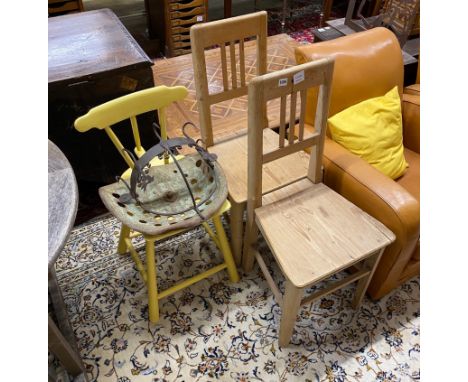 A pair of provincial pine chairs, one other, a pot hanger and vintage tractor seat