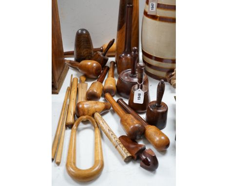 A mixed collection of treen leather and lead working tools etc. tallest 70cm