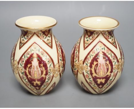 A pair of Zsolnay vases, 13cm