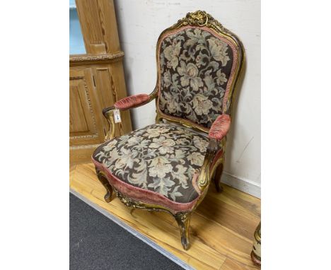 A 19th century French carved giltwood open armchair with floral tapestry upholstery, width 65cm, depth 66cm, height 96cm