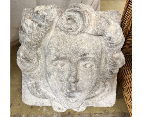 A stone carved corbel, width 30cm, depth 23cm, height 30cm