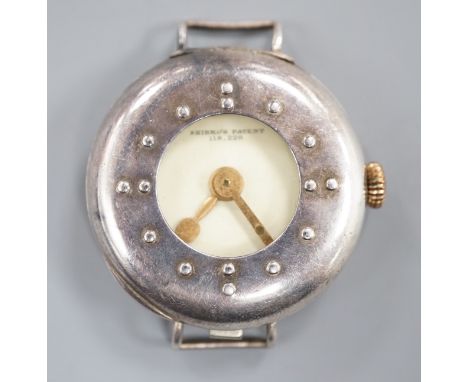 A gentleman's silver Shibko's patent Braille dial manual wind wrist watch, no strap.