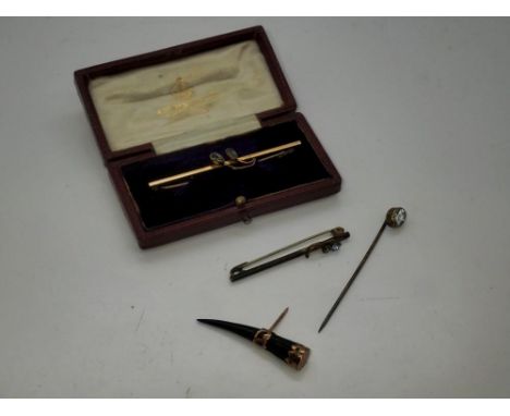9ct gold bar brooch, set with two aquamarine, L: 56 mm, 1.7g, boxed, with three further Victorian pins/brooches. UK P&amp;P G