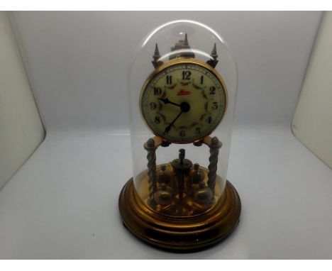 Kerr mantel clock under a glass dome with ceramic dial, not working at lotting. UK P&amp;P Group 2 (£20+VAT for the first lot