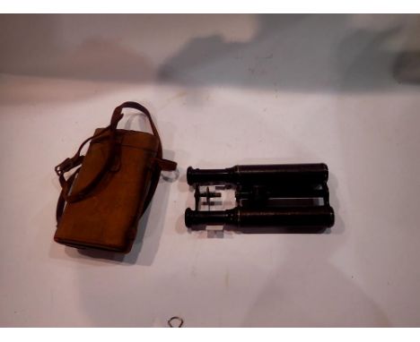 Lennie (Edinburgh) pair of slimline leather bound hunting binoculars, centre winding stem damaged. UK P&amp;P Group 1 (£16+VA