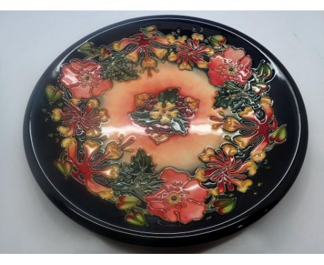 Moorcroft plate in the Oberon pattern, crazing throughout but no cracks or chips, D: 26 cm. UK P&amp;P Group 2 (£20+VAT for t