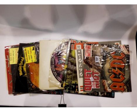 Mixed rock 12" singles, picture discs etc including AC/DC. UK P&amp;P Group 2 (£20+VAT for the first lot and £4+VAT for subse