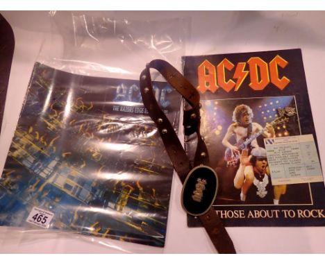 Two AC/DC concert programmes, a concert ticket from 1982, and two pieces of merchandise. UK P&amp;P Group 2 (£20+VAT for the 