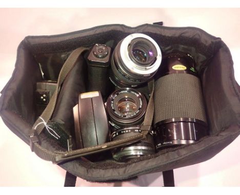 Olympus OM20 outfit in a carry bag. UK P&amp;P Group 2 (£20+VAT for the first lot and £4+VAT for subsequent lots) 