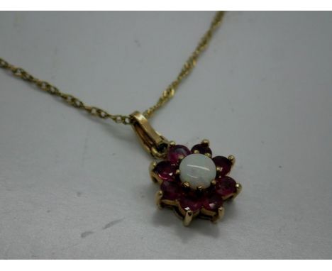 9ct gold pendant necklace set with rubies and opal, chain L: 46 cm, 3.1g. UK P&amp;P Group 0 (£6+VAT for the first lot and £1