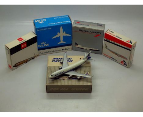 Five toy model aeroplanes, boxed. UK P&amp;P Group 2 (£20+VAT for the first lot and £4+VAT for subsequent lots) 