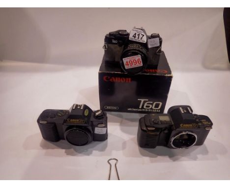 Canon T60 35mm SLR camera body with lens, boxed with a Canon T50 and Canon T70 camera bodies. UK P&amp;P Group 2 (£20+VAT for