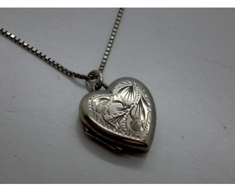 Hallmarked silver locket pendant on a 925 silver chain, chain L: 50 cm. UK P&amp;P Group 0 (£6+VAT for the first lot and £1+V