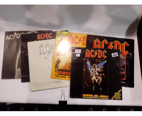 Two AC/DC albums, three 12" singles and a limited edition maxi single. UK P&amp;P Group 2 (£20+VAT for the first lot and £4+V