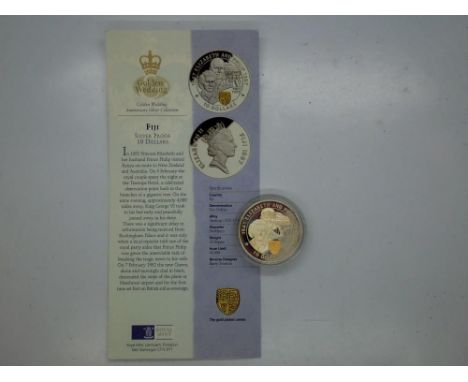 1997 Queen Elizabeth and Prince Philip golden wedding Fiji silver proof ten dollars coin, mint condition. UK P&amp;P Group 1 
