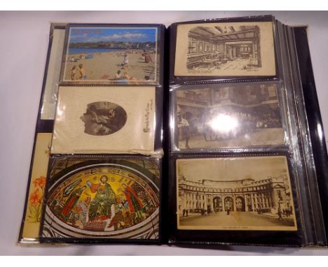 Album containing postcards, including Bamforth's examples. UK P&amp;P Group 1 (£16+VAT for the first lot and £2+VAT for subse