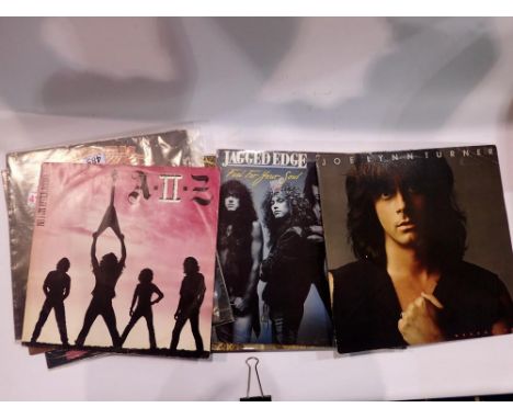 Twelve mixed rock albums, including Hawkwind and Krokus. UK P&amp;P Group 2 (£20+VAT for the first lot and £4+VAT for subsequ
