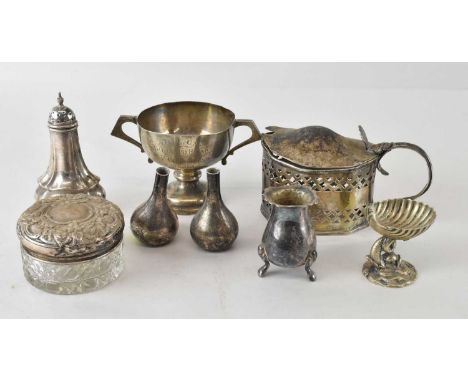 Eight items of hallmarked silver and electroplate, comprising an Edward VII silver pepper pot, Walker &amp; Hall, Sheffield 1