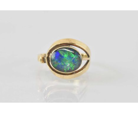 A 10k gold contemporary ring with opal style panel, size O, approx 3.3g.