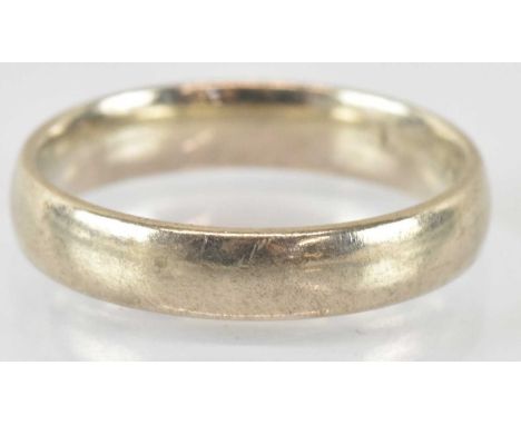 A 9ct white gold band ring, size N, approx 3g.