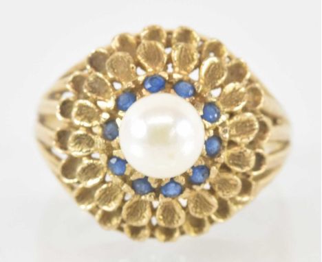A 14ct yellow gold seed pearl and blue stone set ring, size N, approx 4.2g.