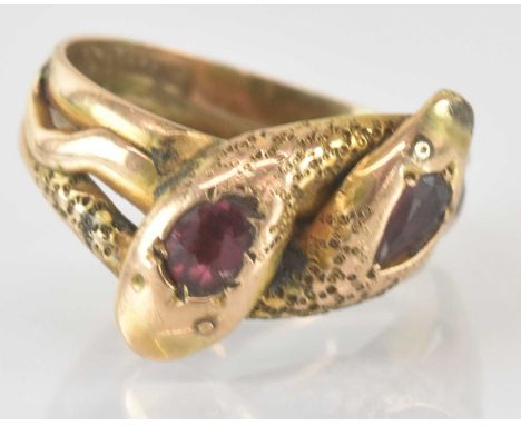 A 9ct gold ring with crossover snake head, each head inset with amethyst stone, size S, approx 4.7g.