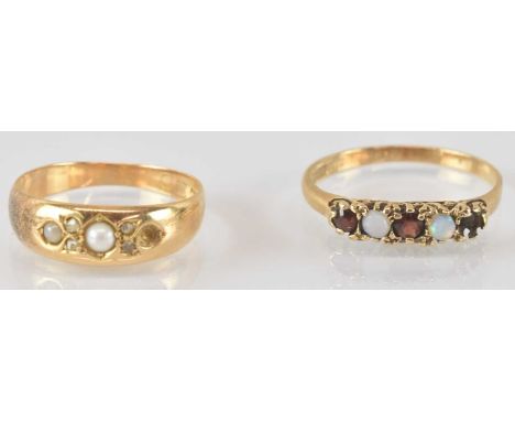 Two gold rings comprising an 18ct seed pearl set ring (one seed pearl missing), size N, approx 2.9g, and a 9ct gold opal and 