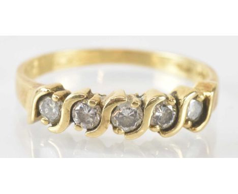 A 14ct yellow gold five stone diamond set ring, the five small round brilliant cut stones totalling approx 0.5ct, size P, app