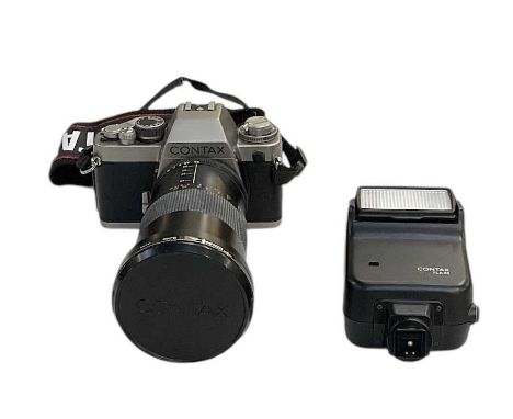 CONTAX; an S2 camera with 82mm 85-28 lens, cased with lens cover and flash.Condition Report: This camera has not been checked