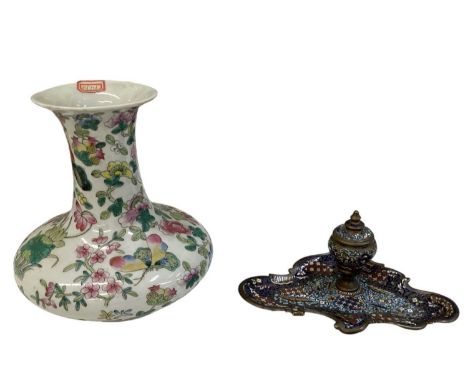 A modern Chinese porcelain vase, decorated with butterflies amongst foliage, with Qianlong mark to base, height 21cm, and a m