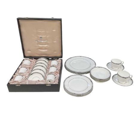 WEDGWOOD; a cased set of six 'Amherst' pattern coffee cans and saucers, with matching part tea service comprising two teacups
