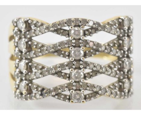 A 9ct yellow gold diamond set ring, size R/S, approx 4.3g, with certificate of authenticity.